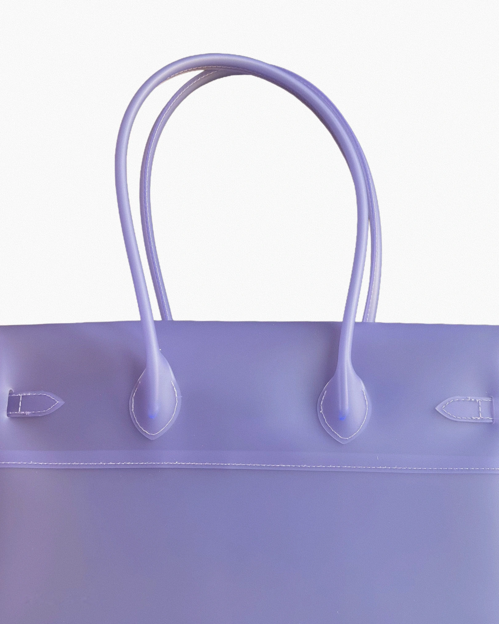 frosted translucent purple jelly tote seen from the back, with two rolled purple handles